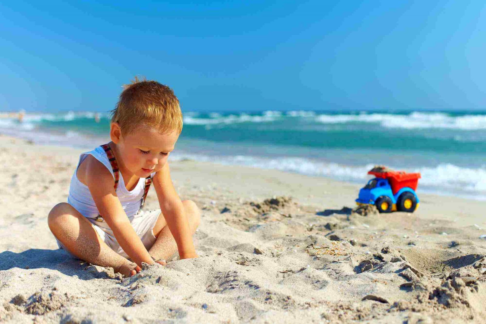 toddler at beach outdoor activities for kids